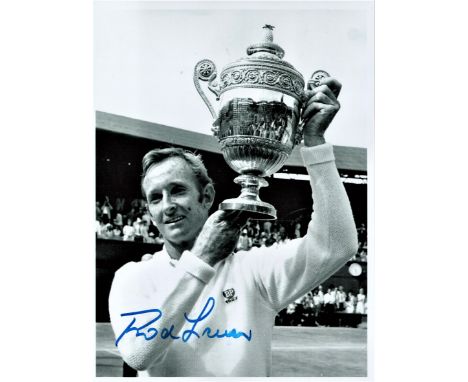 Rod Laver signed 8x6 black and white photo pictured holding the Wimbledon Mens singles trophy. Rodney George Laver AC MBE, bo