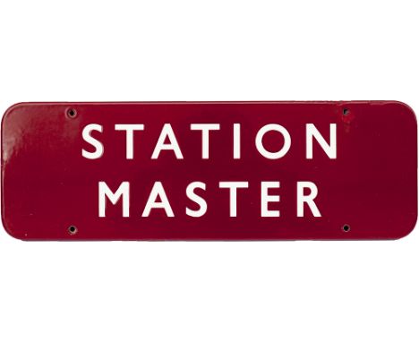 BR(M) enamel doorplate STATION MASTER measuring 18in x 6in. In good condition with a couple of small edge chips and one aroun
