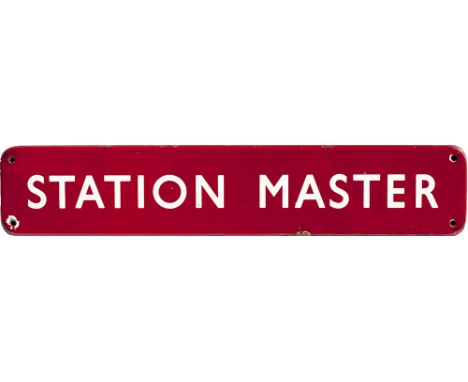 BR(M) FF enamel doorplate STATION MASTER measuring 18in x 3.5in. In very good condition with a few small edge chips.