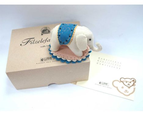 Steiff Felt Elephant 1880, white limited edition 79/2006, boxed with certificate, 14cm high.No fraying or discolouration, eye