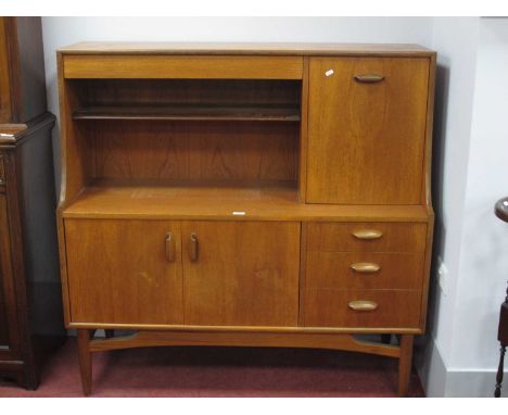 1970's Teak High Backed Sideboard, with lipped protruding handles to right side compartment, three right side drawers and cup