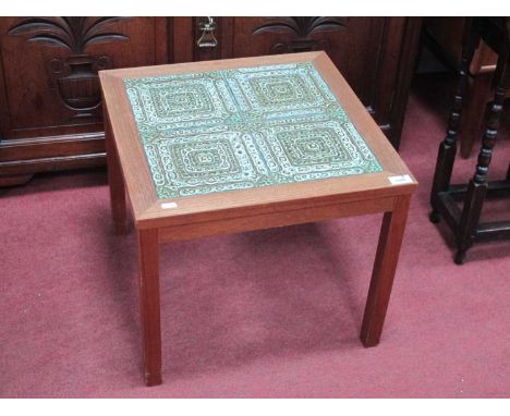 Danish Teak Coffee Table Circa 1960's/70's, with four ceramic tile inset, featuring protruding concentric squares to square t