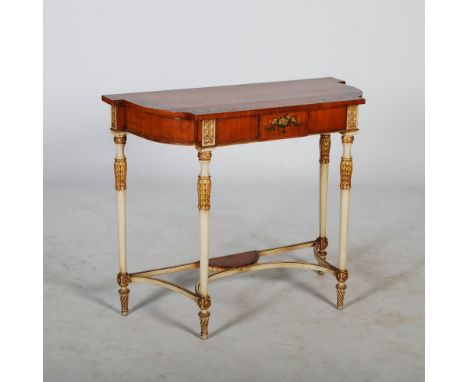 A late 19th/ early 20th century painted satinwood console table, the shaped rectangular top decorated with a border of blue a