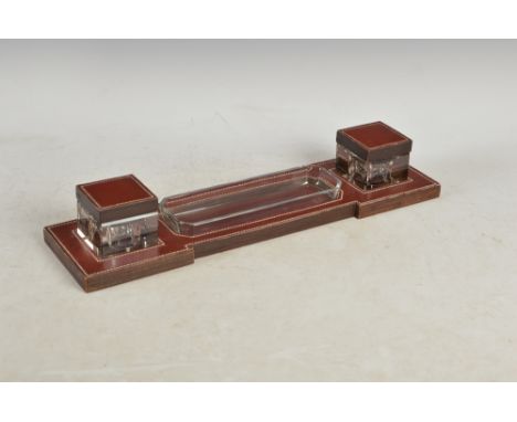 Hermes, Paris, a leather, wood and glass desk stand, with central removable glass pen tray flanked by two removable square gl