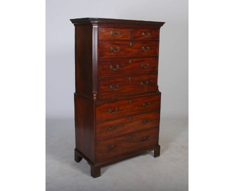 A George III mahogany chest on chest, the moulded cornice with egg and dart and dentil frieze above two short and three long 