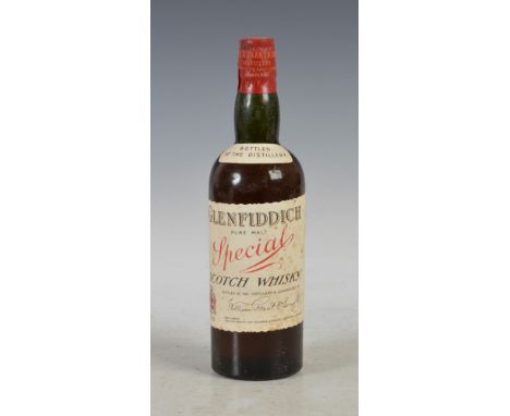 One bottle of Glenfiddich Special Pure Malt Scotch Whisky, circa 1950's, with original William Grant & Sons Ltd. tissue wrapp