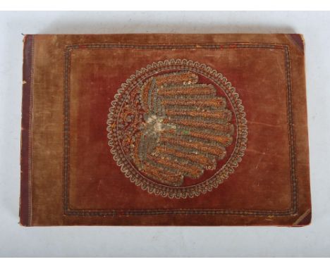 A late 19th century photograph album depicting The People, Places and Monuments of Burma, the velvet, sequin and applique cov