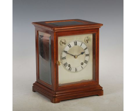 A late 19th/ early 20th century Westminster Chime mantle clock, the rectangular dial with silvered Roman numeral chapter ring
