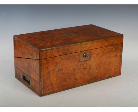 A Victorian burr walnut, coromandel and brass inlaid writing slope of large size, the hinged rectangular top inlaid with a re