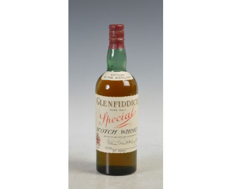 One bottle of Glenfiddich Special Pure Malt Scotch Whisky, circa 1950's, with original William Grant & Sons Ltd. tissue wrapp
