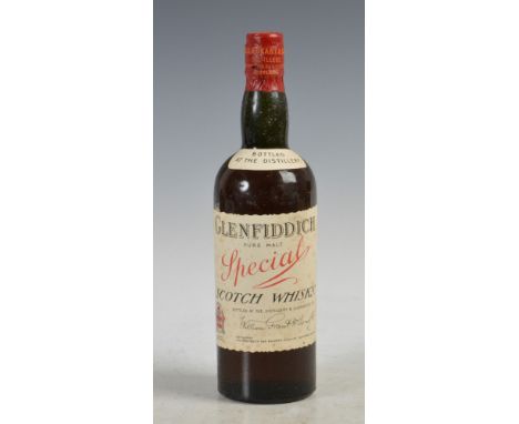 One bottle of Glenfiddich Special Pure Malt Scotch Whisky, circa 1950's, with original William Grant & Sons Ltd. tissue wrapp