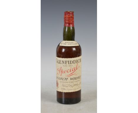 One bottle of Glenfiddich Special Pure Malt Scotch Whisky, circa 1950's, with original William Grant & Sons Ltd. tissue wrapp