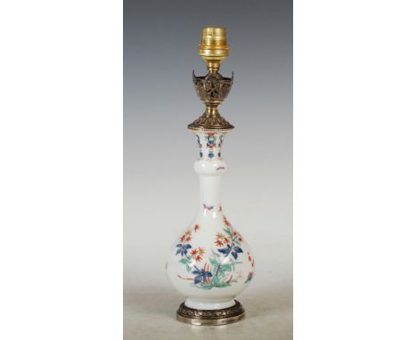 A Continental porcelain white metal mounted Kakiemon bottle vase mounted as a table lamp, the base mount stamped 'A.RISLER & 