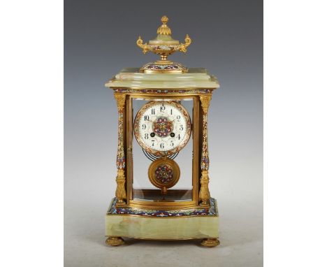A late 19th/ early 20th century French onyx, ormolu and champleve enamel mantle clock MUMMERY & SON, PARIS, the circular dial