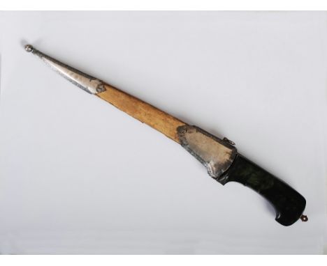 A late 19th century jade-hilted Persian dagger, the single edged blade within a wood and white metal mounted sheath, the hand
