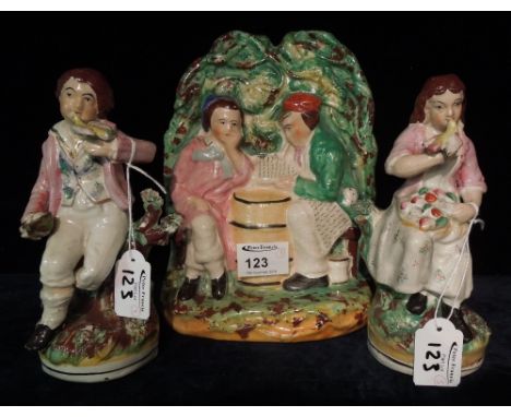 Staffordshire pottery flat back figure group of figures, man smoking pipe and female, together with pair of Staffordshire pot