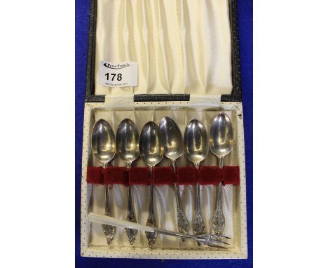 Cased set of six silver teaspoons and silver mother-of-pearl pickle fork. 