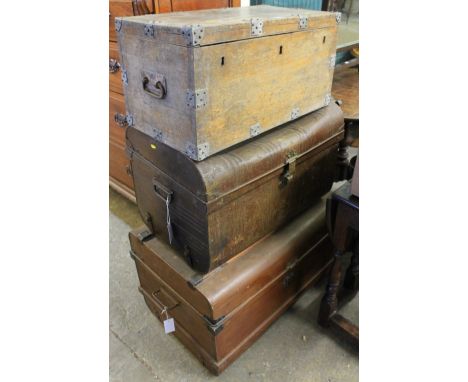 Two similar vintage metal tin trunks together with a vintage oak metal banded work box. (3) CONDITION REPORT: Trunk is very d