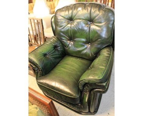 Green leather button back easy chair.
