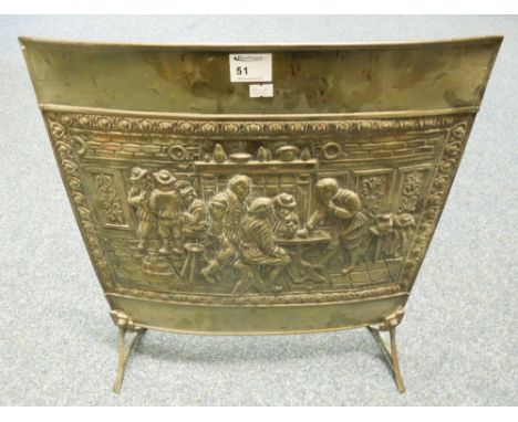 Repousse brass figure decorated fire screen.