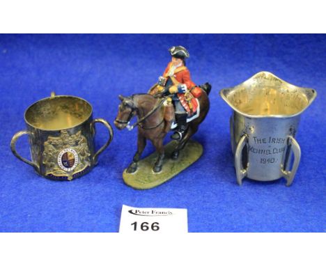 Silver plated tyg with enamel coat of arms together with silver rocket design Weir and Sons, Dublin, cup, engraved: 'The Iris
