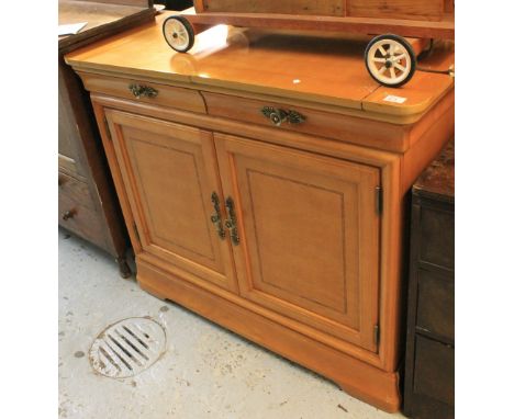 Modern satinwood sideboard on bracket feet.