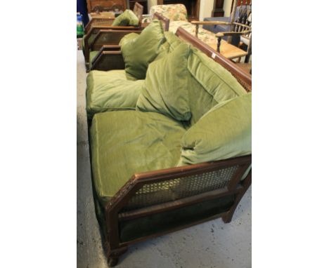 Early 20th Century single cane bergere suite, comprising two seater sofa and pair of armchairs. (3) CONDITION REPORT: Cane of