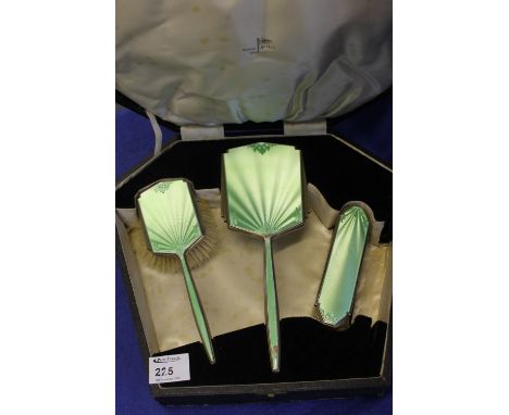 Cased three piece Art Deco design enamel and silver vanity set comprising two brushes and mirror.