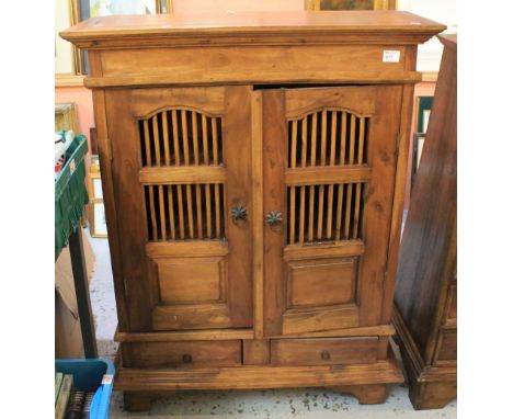 Modern hardwood two door bookcase cabinet with fitted drawers on bracket feet. CONDITION REPORT: 'Mexican' modern reproductio