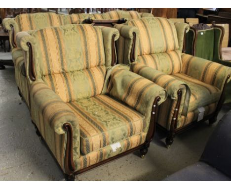 Modern upholstered three piece suite comprising large three seater sofa, pair of armchairs and matching stool. (4)