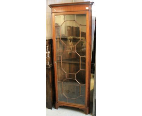 Mahogany astragal glazed corner cabinet on bracket feet.