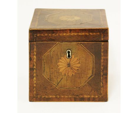 A George III mahogany inlaid and feather banded tea caddy,with an internal cover, 11.5cm wide 11.5cm high 11.5cm deep