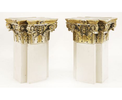 A pair of lamp tables,19th century, the tops carved with marble capitals, with highlights of gilt, with mason's marks, now ra