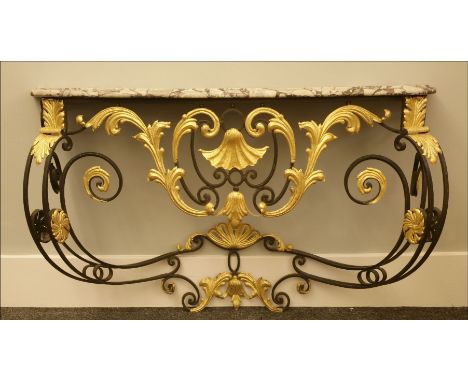 A wrought iron and gilt console table,the serpentine-fronted, grey-veined marble top, raised on a scrolled stand with gilt le