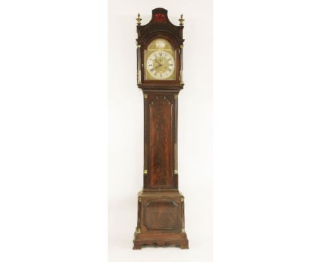 A George III mahogany eight-day longcase clock,by John Neale, Leadenhall Street, London, the arched brass dial with a silvere