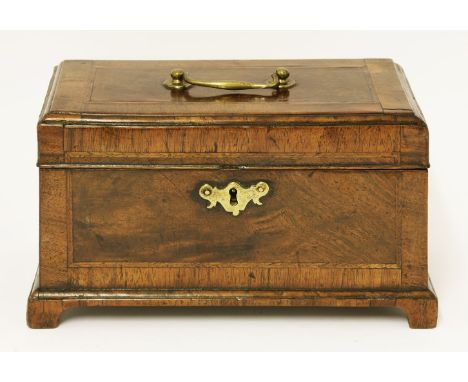 A George III mahogany and feather banded tea caddy, with three compartments, raised on bracket feet, 25.5cm wide 14cm deep 15