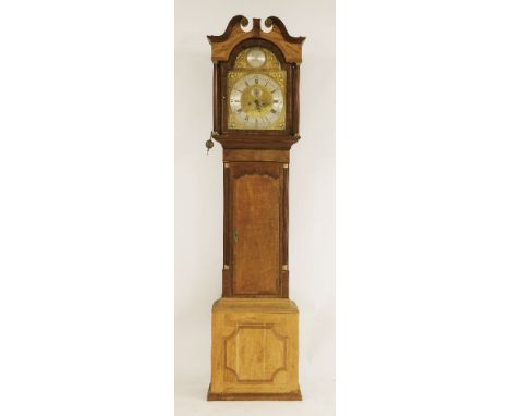 An oak and mahogany eight-day longcase clock,19th century, by James Farr, Bromyard, the arched brass dial with a signed boss 