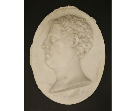 An oval marble plaque,19th century, carved in relief with a portrait of a gentleman,45cm high34cm wideProvenance:  By repute,