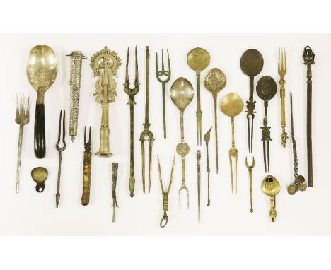 Twenty-five various Middle Eastern cutlery items, comprising:nine spoons, some folding, and nine forks,a finial, a twist turn