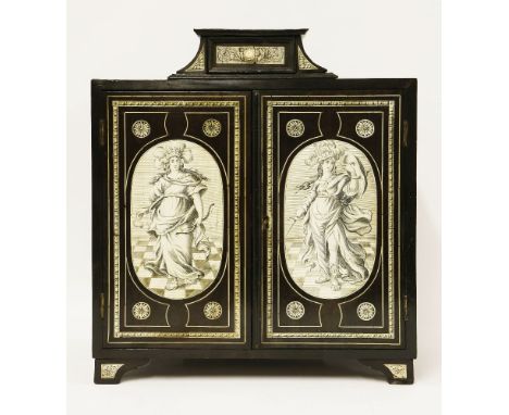 A Milanese ebony and ivory table cabinet,late 17th century, the top section fitted with a drawer over cupboards, the panels i