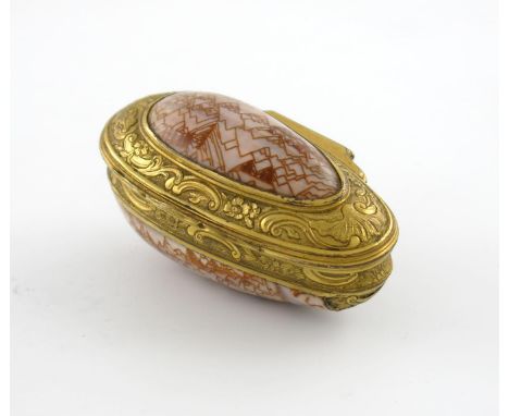 A George III gilt-metal mounted shell snuff box, unmarked circa 1760, the mounts with chased foliate scroll decoration, plain