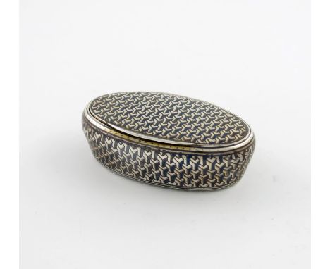 A 19th century French silver and niello work snuff box, maker's mark of L.B in a lozenge, oval form, the cover, tapering side