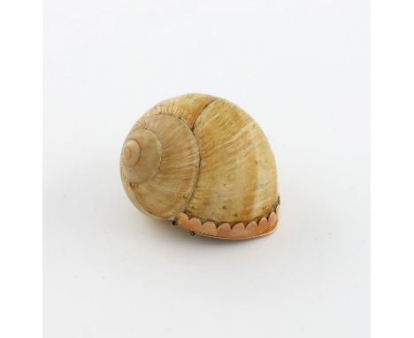 A 19th century gold mounted snail snuff box, circa 1825, plain mounts, the hinged cover inscribed ' 28.1.15', length 4.5cm.