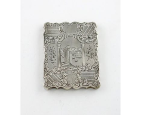 A Victorian silver engraved 'castle-top' card case, Pompeii, by Taylor and Perry, Birmingham 1846, rectangular form, the fron