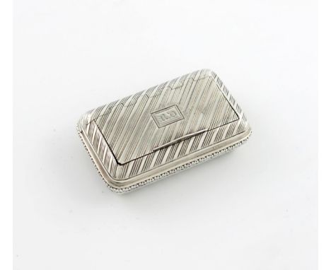 A George III silver snuff box, maker's mark miss-struck, possibly W?, London 1812, rectangular form, cushion sides, diagonal 