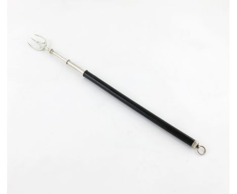 A George III silver telescopic toasting fork, by Joseph Willmore, Birmingham 1810, with a three section system, ebonised hand