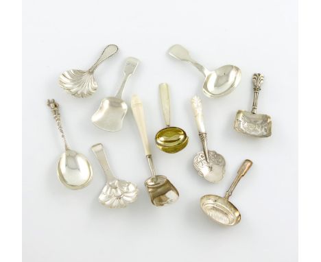 λA collection of ten silver caddy spoons, comprising: one of oval saucepan form, by William Pugh, Birmingham 1816, two with s