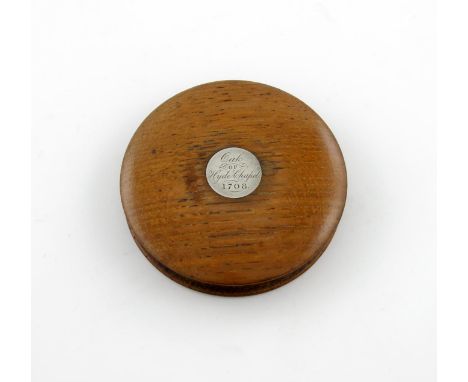 A 19th century silver-mounted treen snuff box, circular form, the pull-off cover with a circular silver disc, inscribed 'Oak 