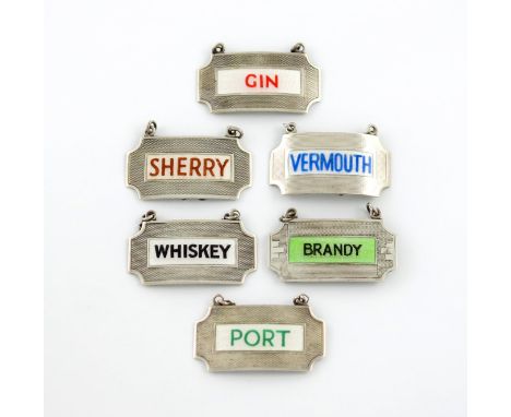 A small collection of six silver and enamel wine labels, by Turner and Simpson, Birmingham various dates, with engine-turned 