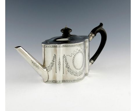 A George III silver teapot, by William Vincent, London 1786, shaped oval form, bright-cut decoration, scroll handle, flush-hi